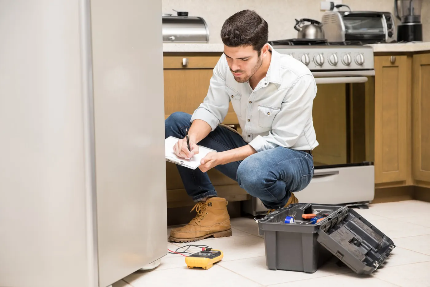 FixQara technician on a home visit near Al Qusais, Dubai